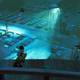 woman looking over a big warehouse